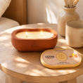 Load image into Gallery viewer, Alma Cinnamon Drift hand-cast stone soy candle by Texan Crafts