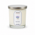 Load image into Gallery viewer, Stella Spa Stone hand-poured soy candle in a white glass jar with a brushed silver lid, on white