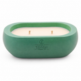 Load image into Gallery viewer, Alma Cedar Frost hand-cast stone soy candle — green vessel with embossed Texan Crafts mark, on white
