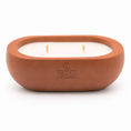 Load image into Gallery viewer, Alma Cinnamon Drift hand-cast stone soy candle — terracotta vessel with embossed Texan Crafts mark, on white
