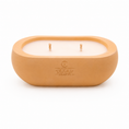 Load image into Gallery viewer, Alma Sunday Loaf hand-cast stone soy candle — wheat vessel with embossed Texan Crafts mark, on white
