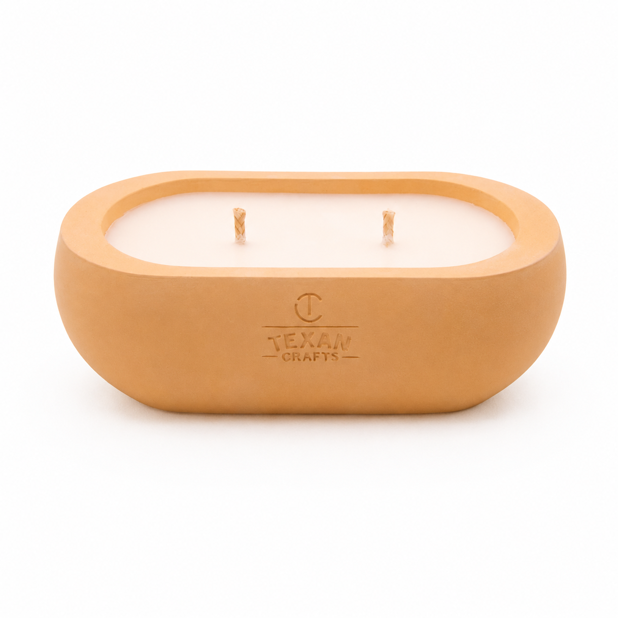 Alma Sunday Loaf hand-cast stone soy candle — wheat vessel with embossed Texan Crafts mark, on white