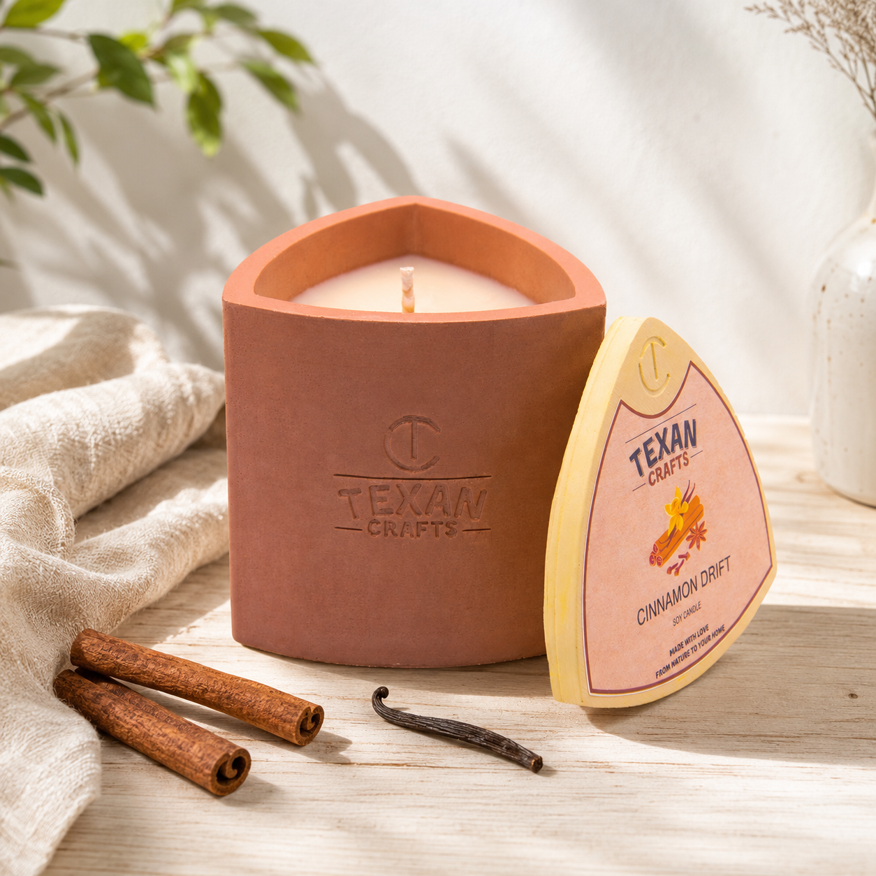 Mica Cinnamon Drift hand-cast stone soy candle by Texan Crafts