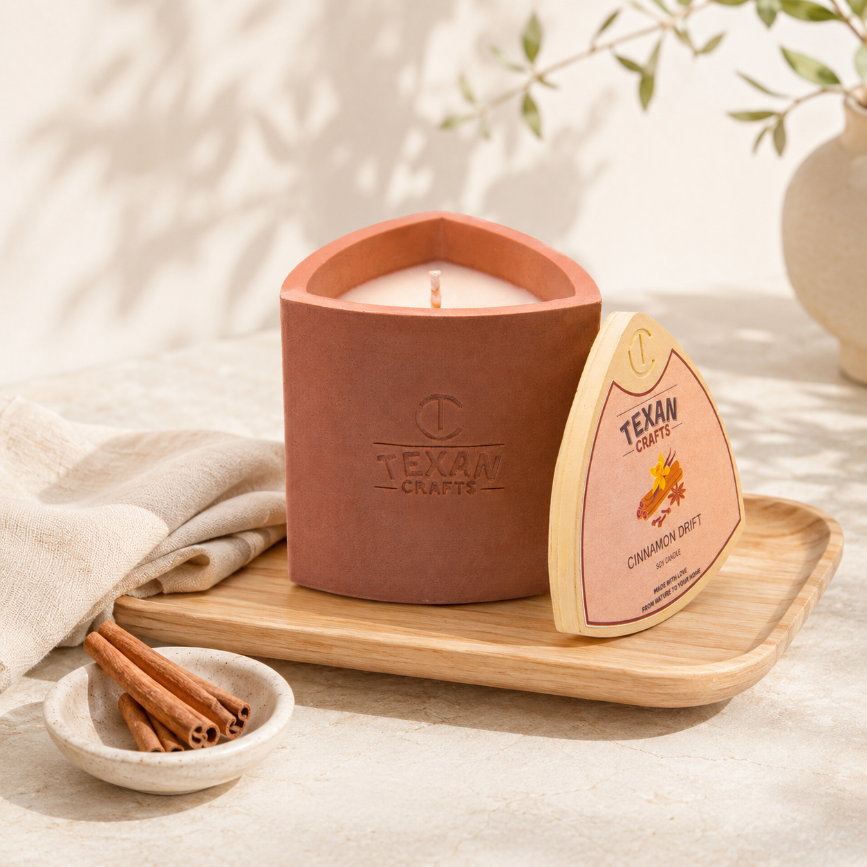 Mica Cinnamon Drift hand-cast stone soy candle by Texan Crafts